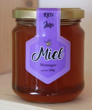 Dégustez la saveur unique du miel de montagne du Jura avec notre pot de 250g
