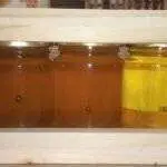 5 Pots de miels de 125g différents dans un jolie coffret bois